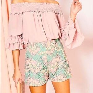 Crochet mesh shorts.